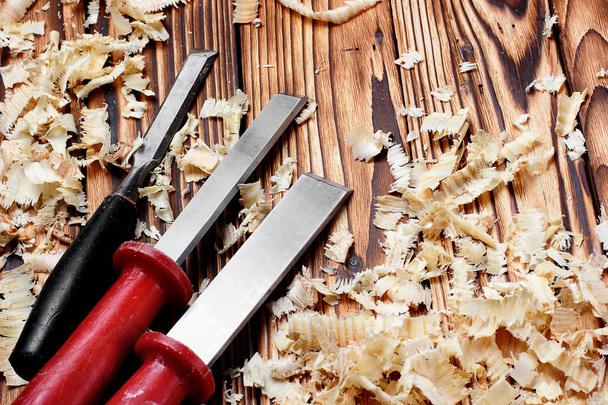 Woodworking tools. Chisel with sawdust .copy space.horizontal shot - Фото, зображення