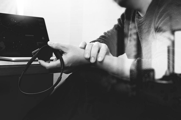 Man using VOIP headset with digital tablet computer docking smar - Fotografie, Obrázek