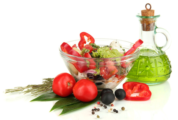 Fresh greek salad in glass bowl isolated on white - Фото, изображение
