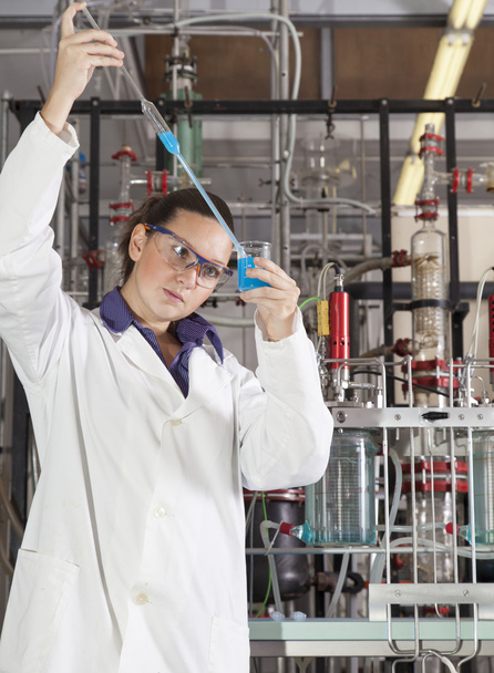 Cute chemist working in laboratory - Photo, Image