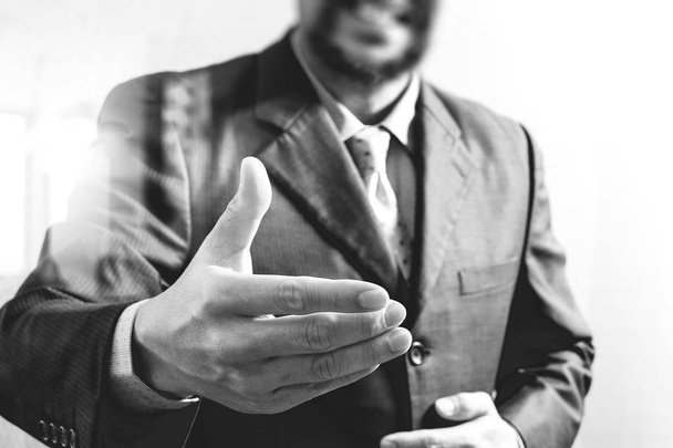 businessman with an open hand ready to seal business investor pr - 写真・画像