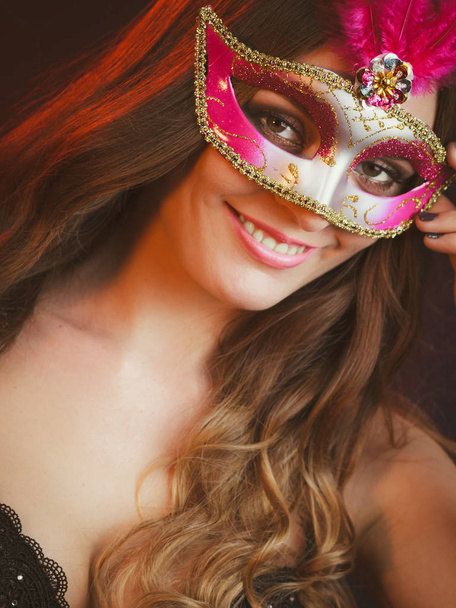Sensual woman with carnival mask. - 写真・画像