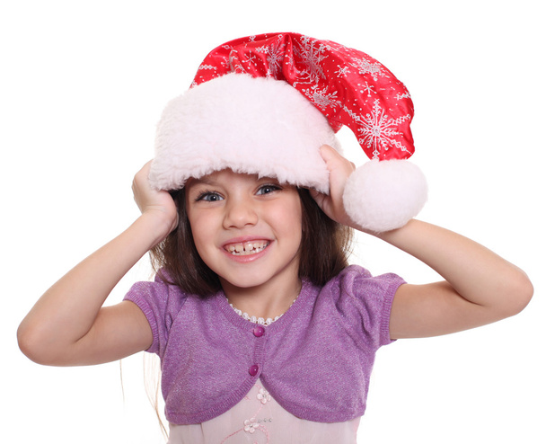 Portrait of happy little girl in Santa hat - Foto, Imagen