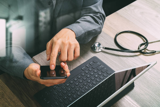 top view of medical doctor hand working with smart phone,digital - Φωτογραφία, εικόνα