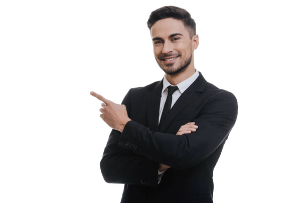 businessman in black suit pointing finger - Фото, изображение