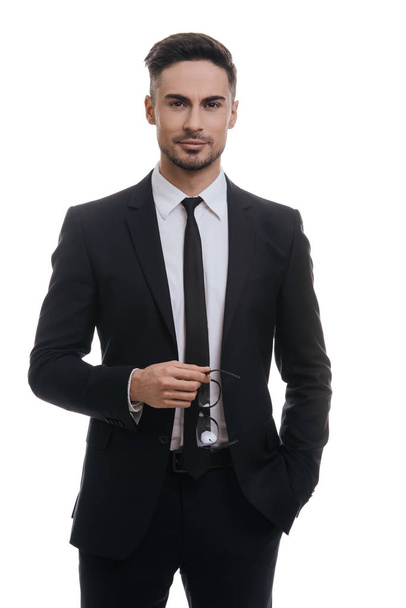 handsome businessman in black suit - Fotó, kép