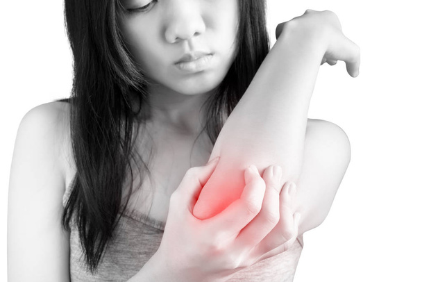 Acute pain in a woman elbow isolated on white background. Clipping path on white background. - Photo, Image