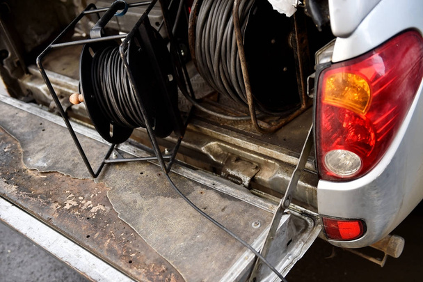 Television cable in a trunk - 写真・画像