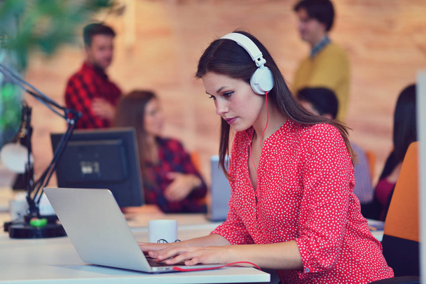 Businesswoman with headset in call center - Foto, Imagem