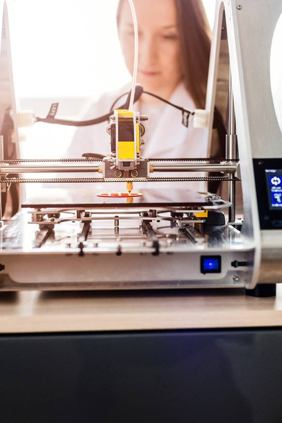 Woman working with 3d printer - Photo, Image