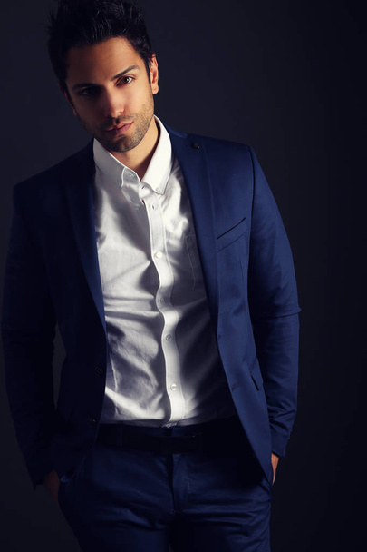 Fashion man model wearing a blue suit - Photo, Image