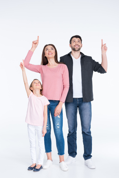 Happy family pointing - Valokuva, kuva