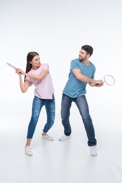 casal com raquetes de badminton
  - Foto, Imagem