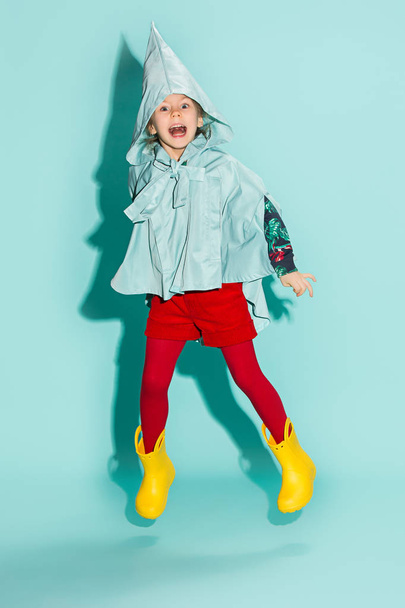 Little girl posing in fashion style wearing autumn clothing. - Fotó, kép