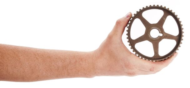 Old camshaft pulley in the man hand - Valokuva, kuva