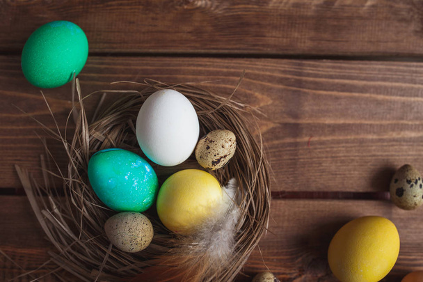 Easter eggs  on rustic wooden  background . - Foto, imagen