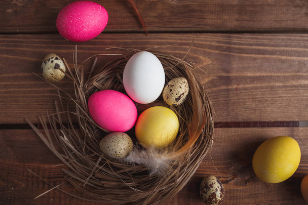 Easter eggs  on rustic wooden  background . - Foto, Imagen