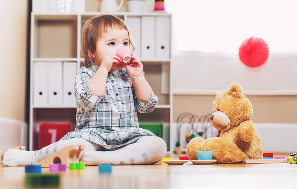 Girl playing with toys - Photo, Image