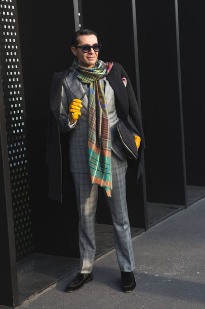 Fashionable man posing during Milan Women's Fashion Week - Fotó, kép