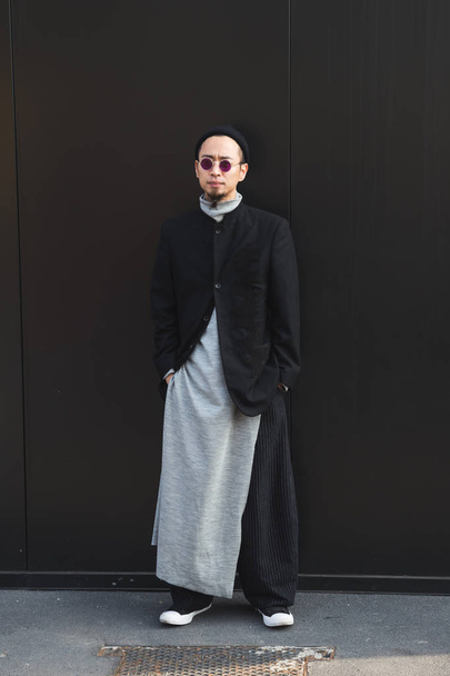 Fashionable man posing during Milan Women's Fashion Week - Foto, Imagen