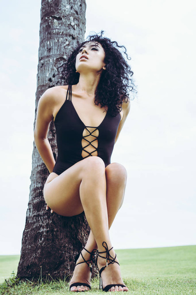 Gorgeous woman in black swimsuit - Zdjęcie, obraz