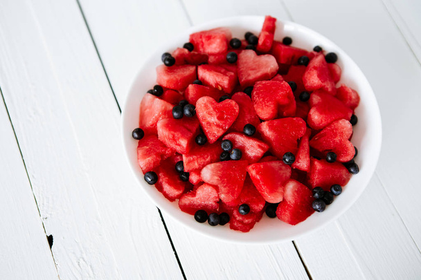 Pieces of watermelon and hearts - Foto, afbeelding