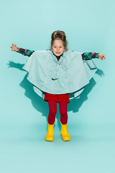 Little girl posing in fashion style wearing autumn clothing. - Фото, изображение