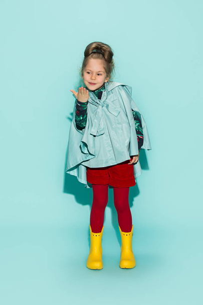 Little girl posing in fashion style wearing autumn clothing. - Фото, изображение