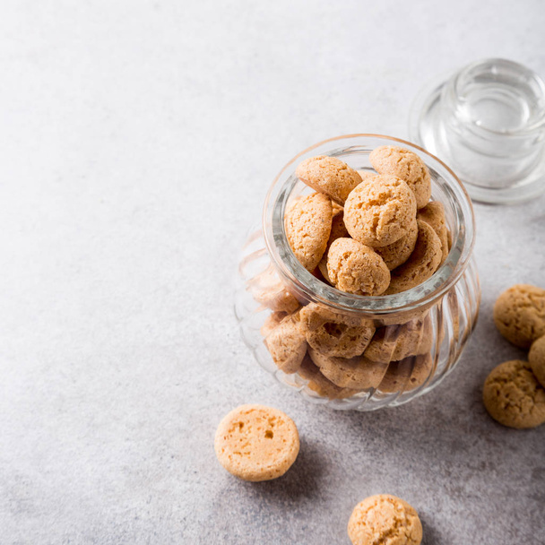 Amaretti cookies in glass pot - Photo, Image