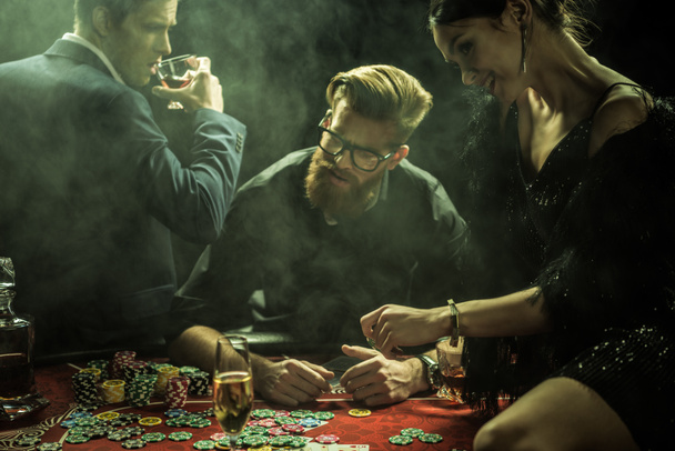 young people playing poker - Fotografie, Obrázek