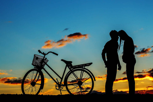 Young of love at sunset. - Photo, Image