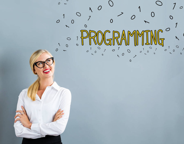 Programming text with business woman - Foto, immagini