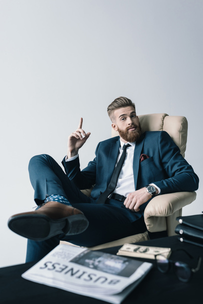 businessman sitting in armchair - Photo, Image