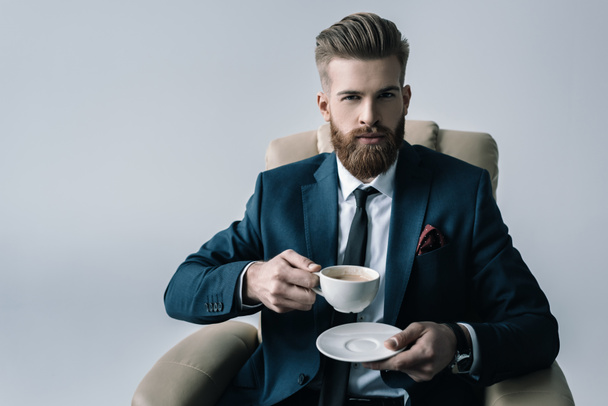 businessman with cup of coffee - Фото, зображення