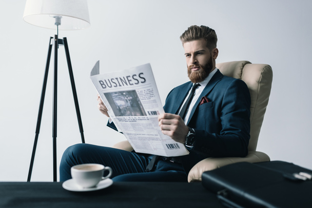 businessman reading newspaper - Fotó, kép