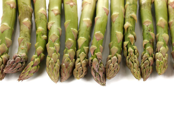 Fresh asparagus isolated on white - Foto, afbeelding