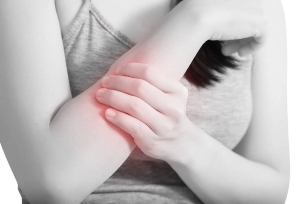 Acute pain in a woman arm isolated on white background. Clipping path on white background. - Photo, Image