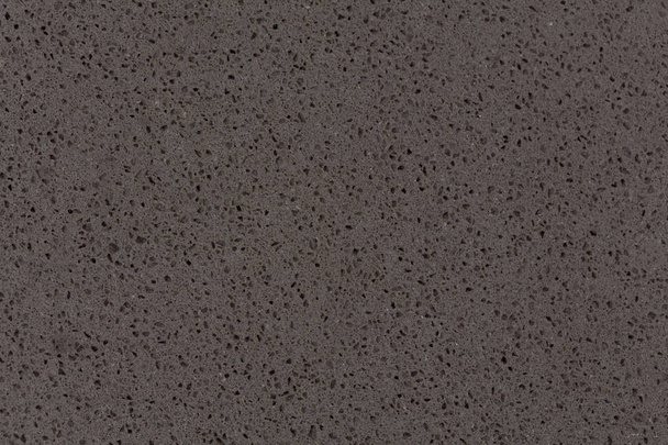 Synthetische kwarts steen textuur, donkere grijze Toon. - Foto, afbeelding