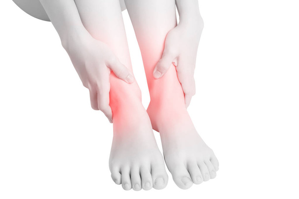 Acute pain in a woman  ankle isolated on white background. Clipping path on white background. - Photo, Image