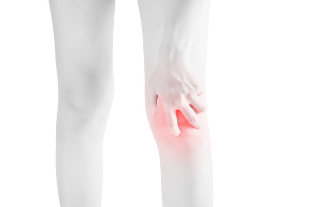 Acute pain in a woman knee isolated on white background. Clipping path on white background. - Photo, Image