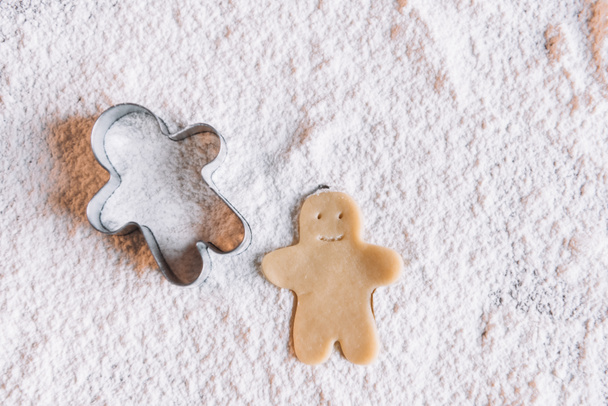 Uncooked gingerbread man - Фото, изображение