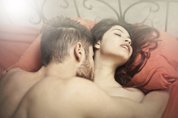 Couple in bed - Фото, изображение