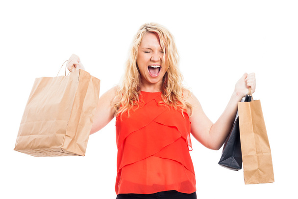 Eksztatikus nő a bevásárló szatyrok - Fotó, kép