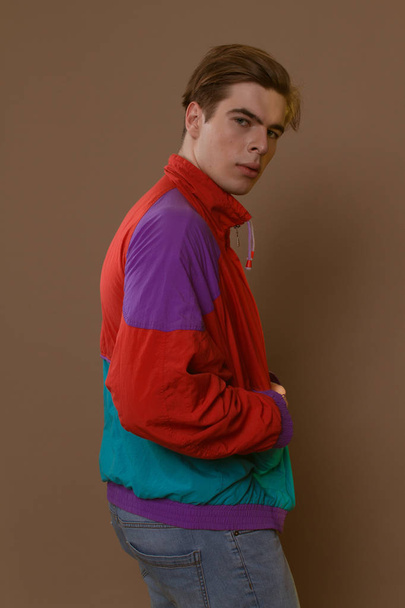 Cute guy in hipster clothes 90s posing in studio - Foto, immagini