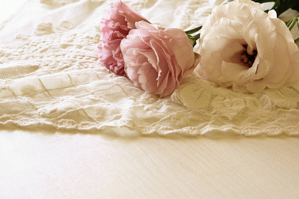 Background of white delicate lace fabric - Φωτογραφία, εικόνα
