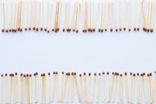 Frame made of matches on a white background - Foto, Bild