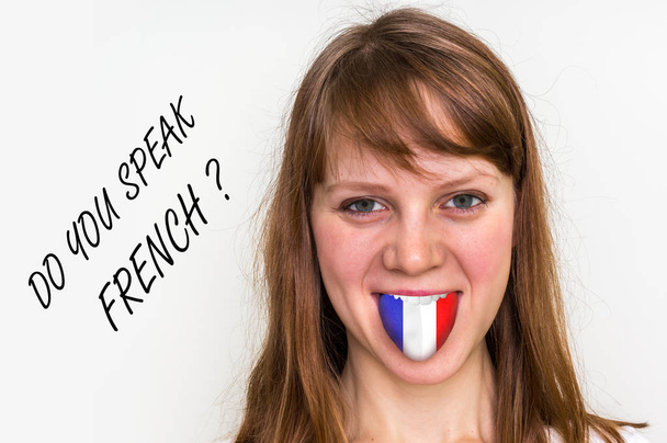 Mluvíte francouzsky? Žena s vlajkou na jazyku - Fotografie, Obrázek