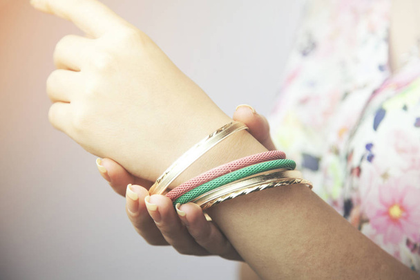 bracelets on woman hand  - Foto, immagini