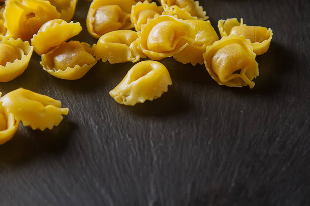 Italian traditional food. Home-made ravioli with cheese and herb - Zdjęcie, obraz