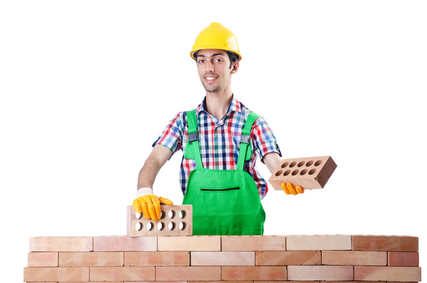 Construtor com chapéu duro no branco
 - Foto, Imagem